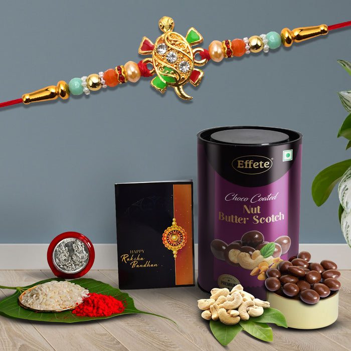 Tortoise Shape With Red & Green Mina With Effete Butterscotch Chocolate 96Gm ,Silver Color Pooja Coin, Roli Chawal & Greeting Card