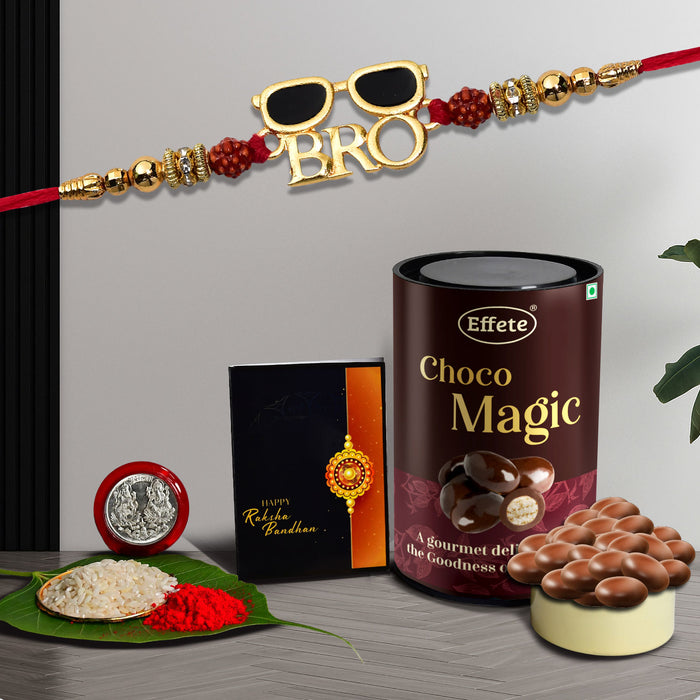 Bro Rakhi Combo with Effete Assorted Choco Magic 96gm, Silver Color Pooja Coin, Roli Chawal & Greeting Card