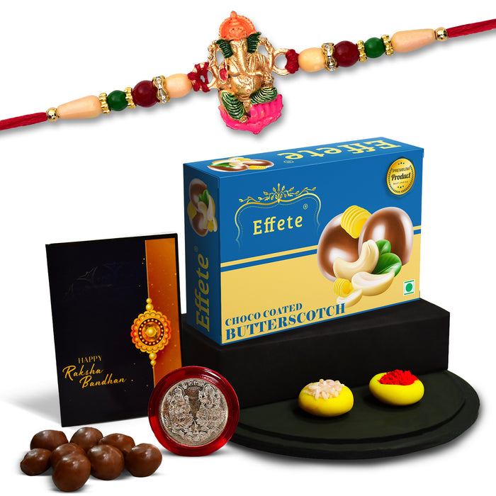 Ganesh Ji With Colorful Beads With Effete Butterscotch Chocolate 32Gm ,Silver Color Pooja Coin, Roli Chawal & Greeting Card