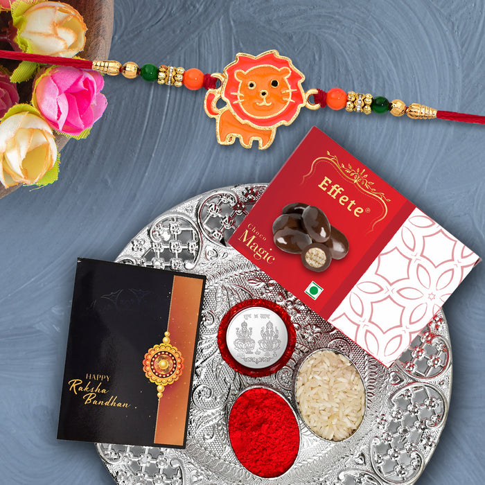Cute Lion Kids Rakhi With Effete Magic Chocolate 32Gm With Pooja Thali ,Silver Color Pooja Coin, Roli Chawal & Greeting Card