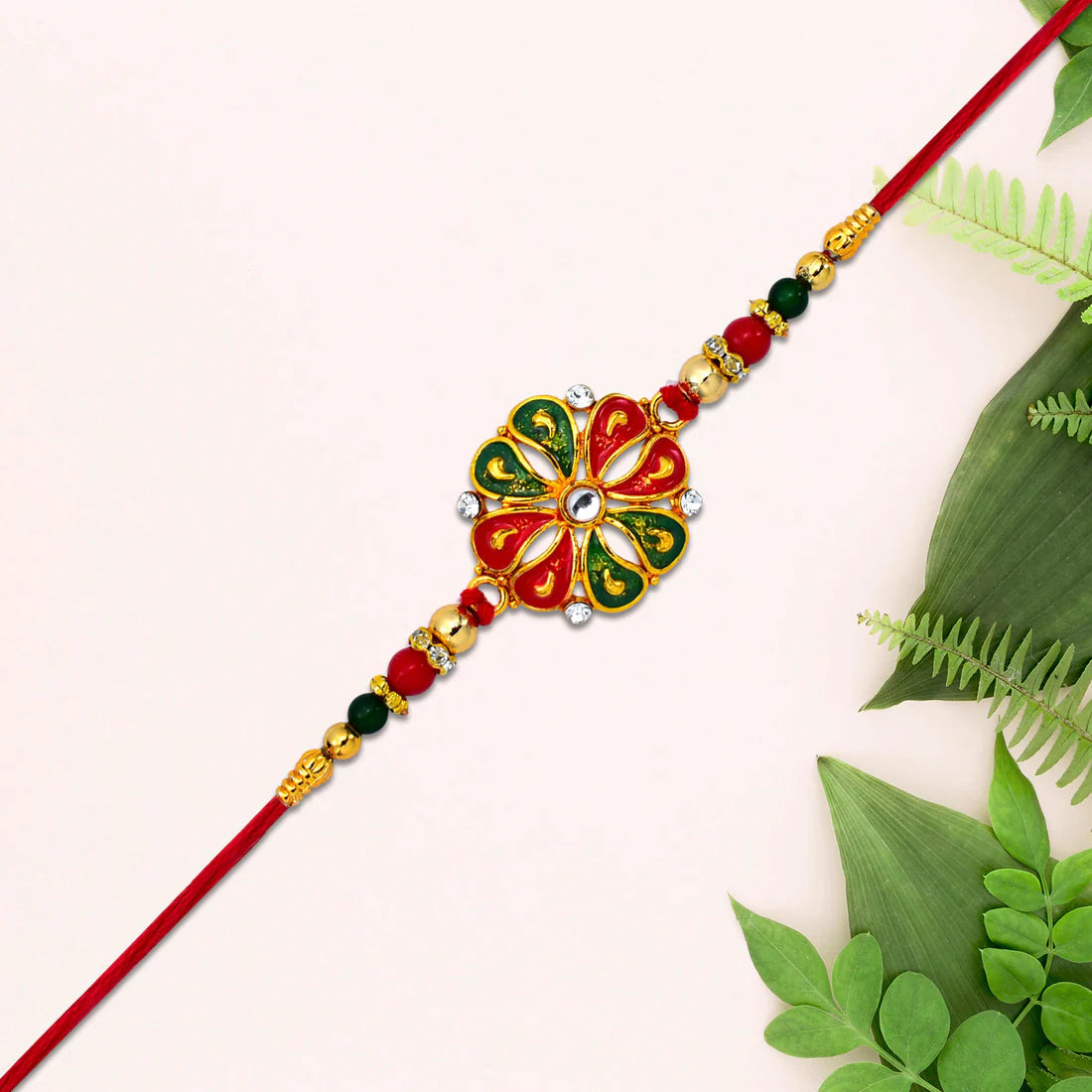 Flower Rakhi for Brother – Enamel & Golden Beads Design