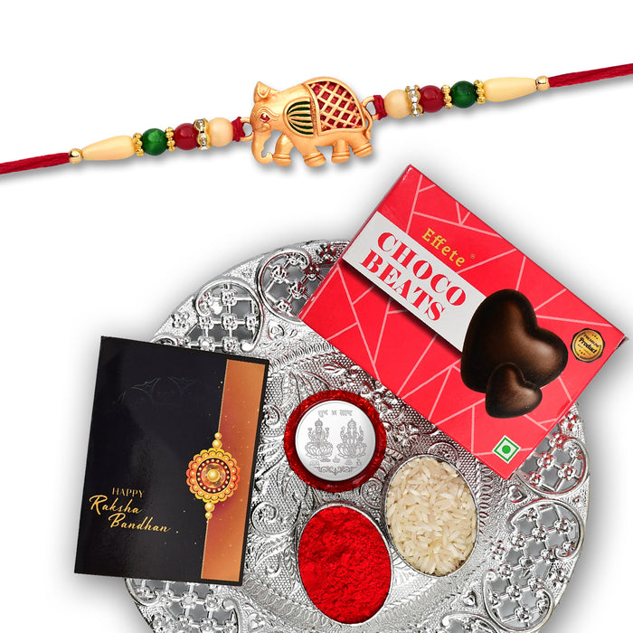 Elephant With Mina Work Rakhi With Effete Choco Beats Chocolate 32Gm With Pooja Thali ,Silver Color Pooja Coin, Roli Chawal & Greeting Card