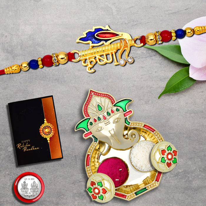 Krushna Rakhi With Morpichh With Ganesha Pooja Thali Set ,Silver Color Pooja Coin, Roli Chawal & Greeting Card