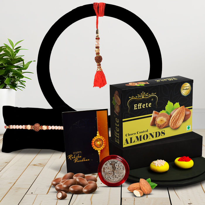 Bright Rakhi With Colorful Beads And A Shiny Center With Effete Choco Almond Chocolate 32Gm ,Silver Color Pooja Coin, Roli Chawal & Greeting Card