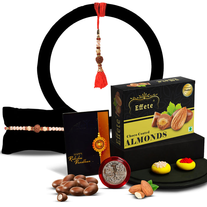 Bright Rakhi With Colorful Beads And A Shiny Center With Effete Choco Almond Chocolate 32Gm ,Silver Color Pooja Coin, Roli Chawal & Greeting Card