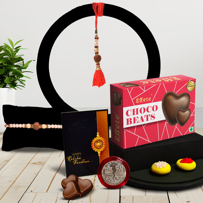 Bright Rakhi With Colorful Beads And A Shiny Center With Effete Choco Beats Chocolate 32Gm ,Silver Color Pooja Coin, Roli Chawal & Greeting Card