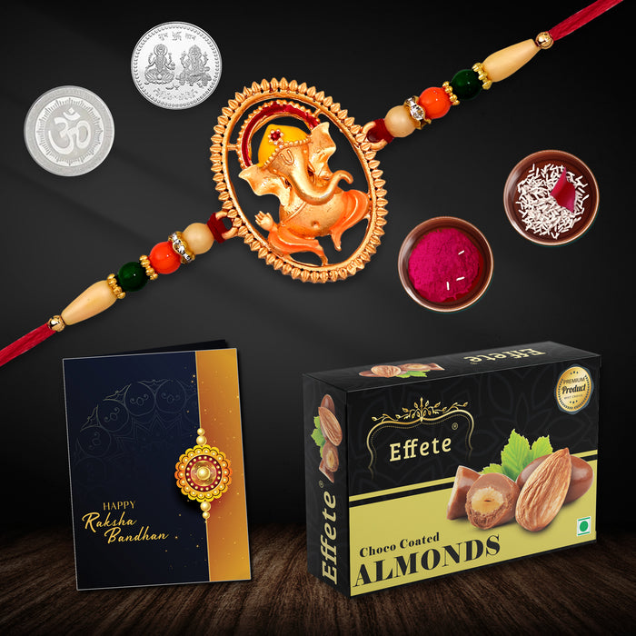 Ganesh Rakhi Combo with Effete Assorted Choco almond 32gm, Silver Color Pooja Coin, Roli Chawal & Greeting Card