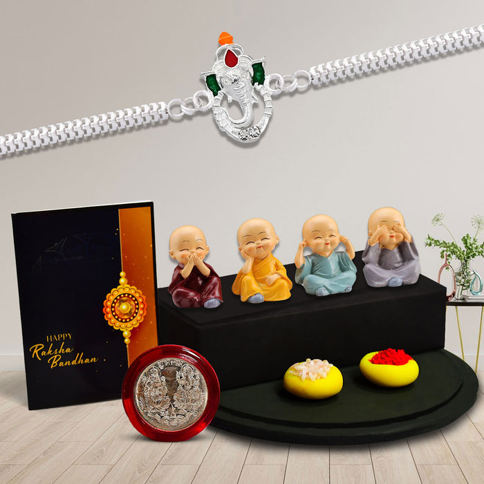 Silver Color Ganesh Rakhi With Decorative Baby Buddha Gift ,Silver Color Pooja Coin, Roli Chawal & Greeting Card