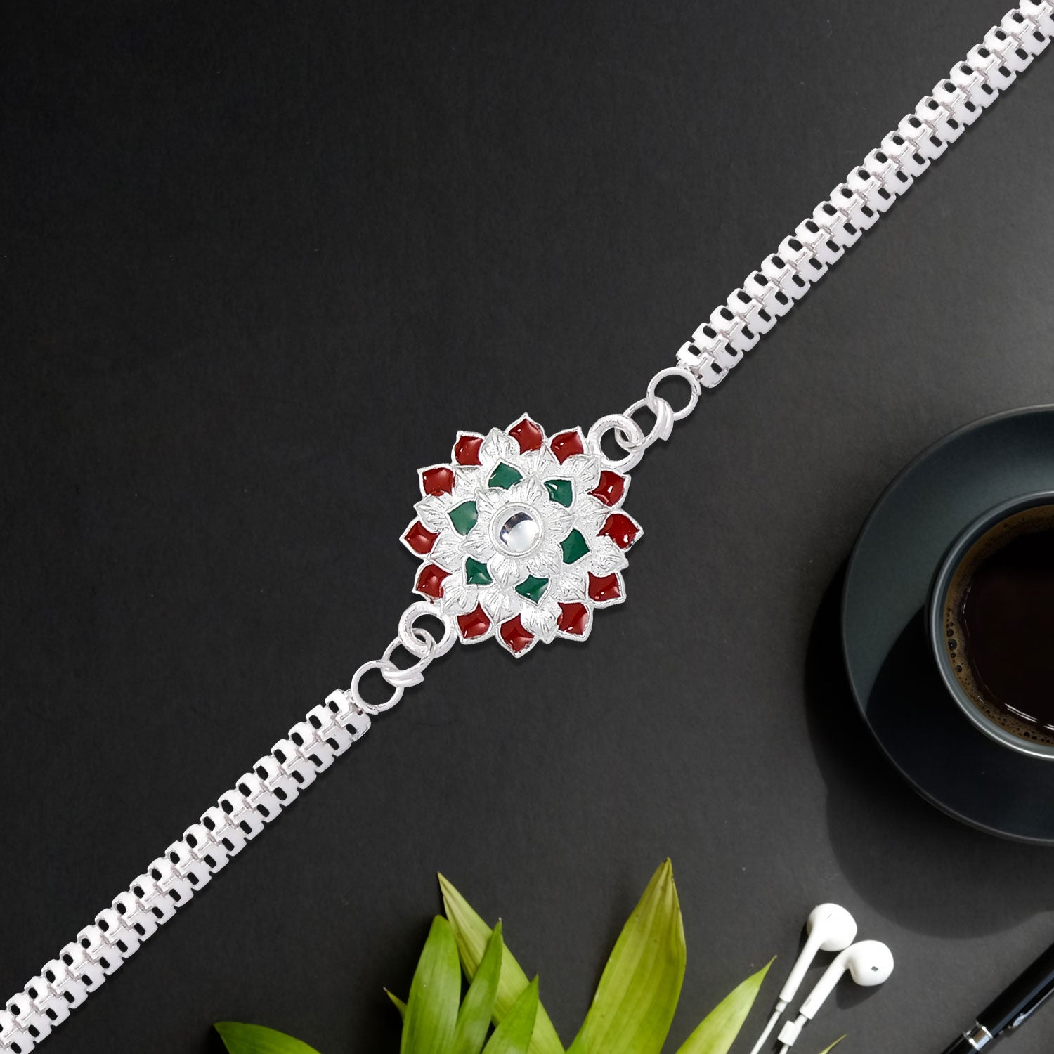 Round Shape Silver Chain Rakhi With  Red-Green Accents