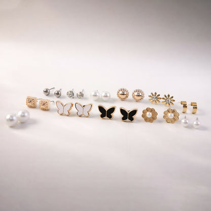 Elegant pearl and butterfly charm earrings included in the 12-pair set