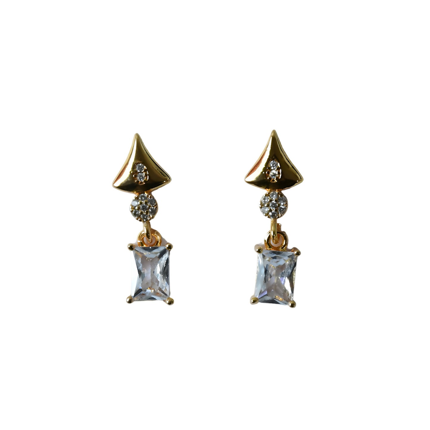 Pair of gold tone geometric crystal drop earrings laid flat showing design details