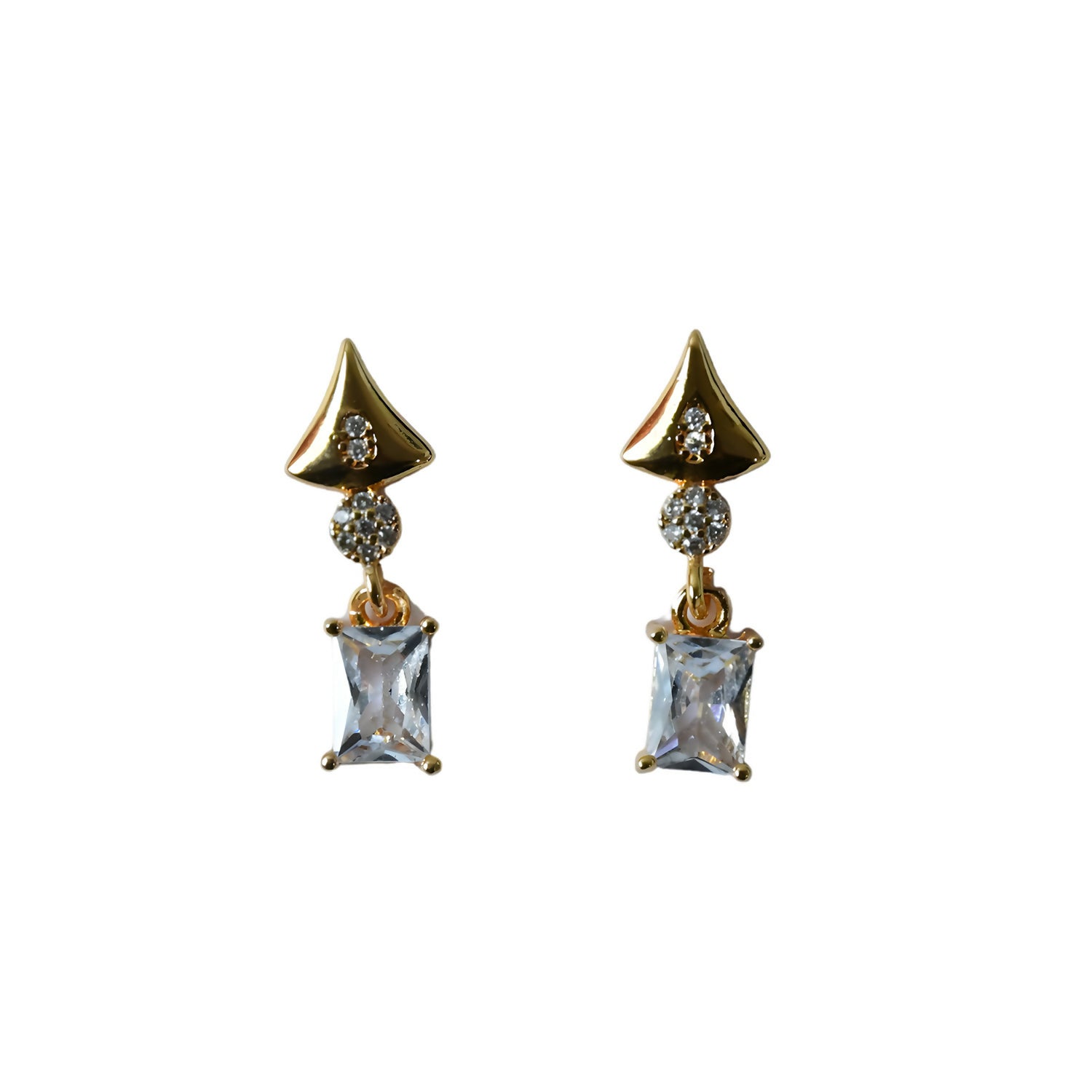 Pair of gold tone geometric crystal drop earrings laid flat showing design details