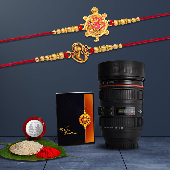 Ganesh And Turtle Golden Color 2 Rakhi With Coffee Camera Lens Mug With Coffee Camera Lense Mug ,Silver Color Pooja Coin, Roli Chawal & Greeting Card
