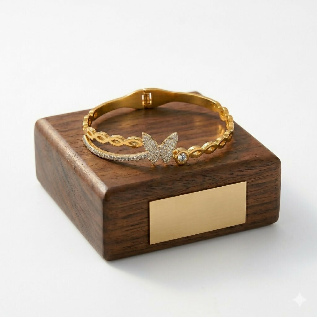 Close-up of floral design on gold-tone botanical kada bracelet