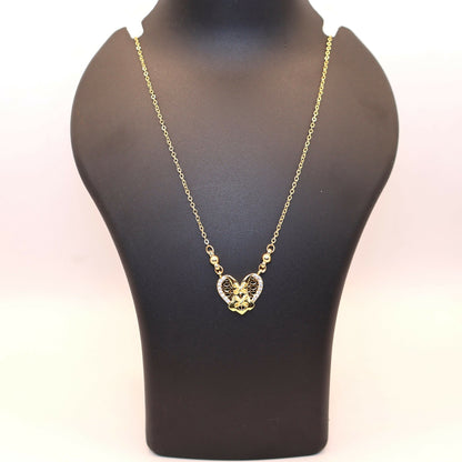 Elegant gold heart pendant necklace displayed on white background