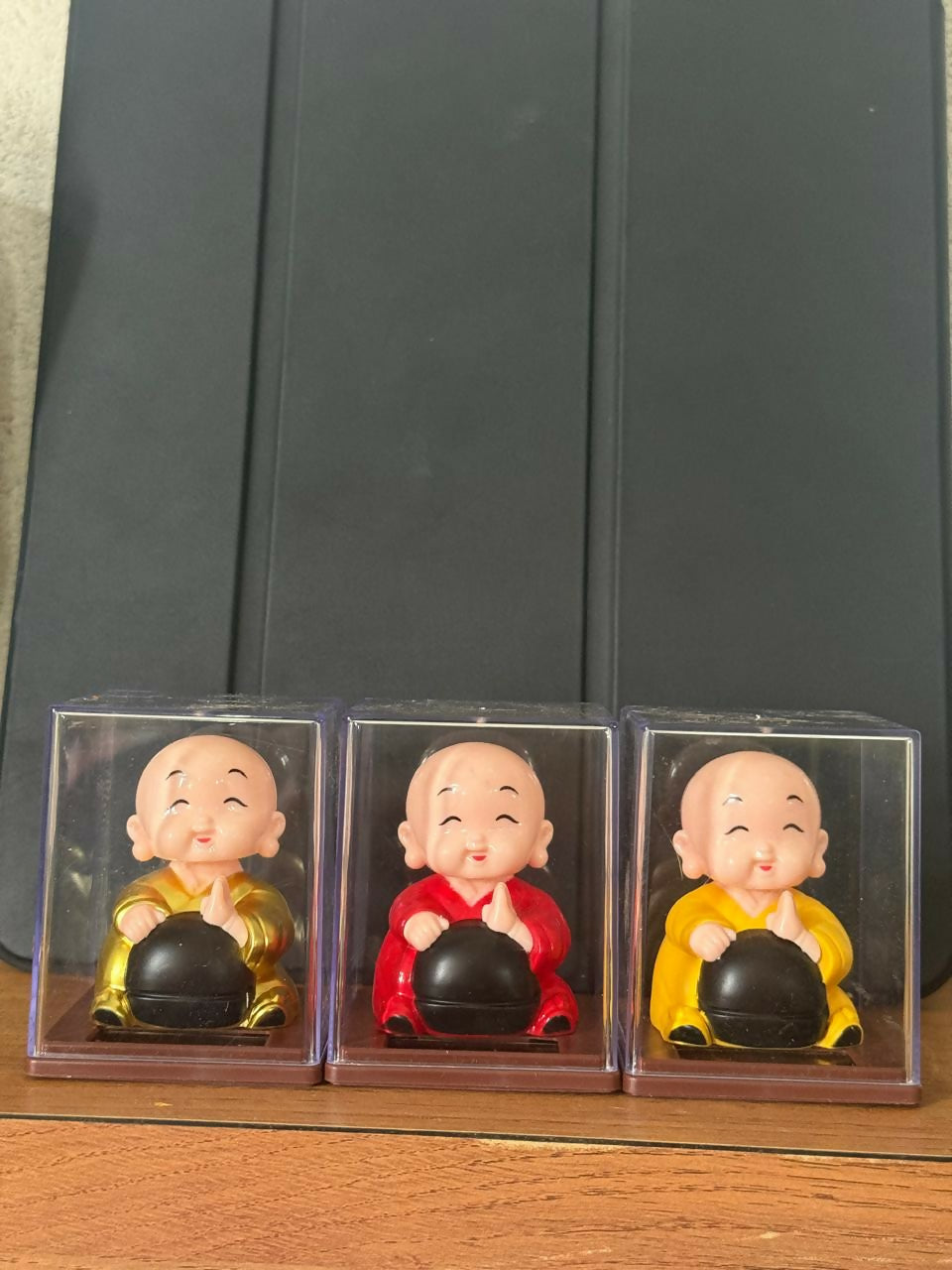 Laughing Buddha Idol in Transparent Display Box for Home & Office Decor (1 PC SOLAR POWERED)