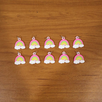 Rainbow cloud keychains on display
