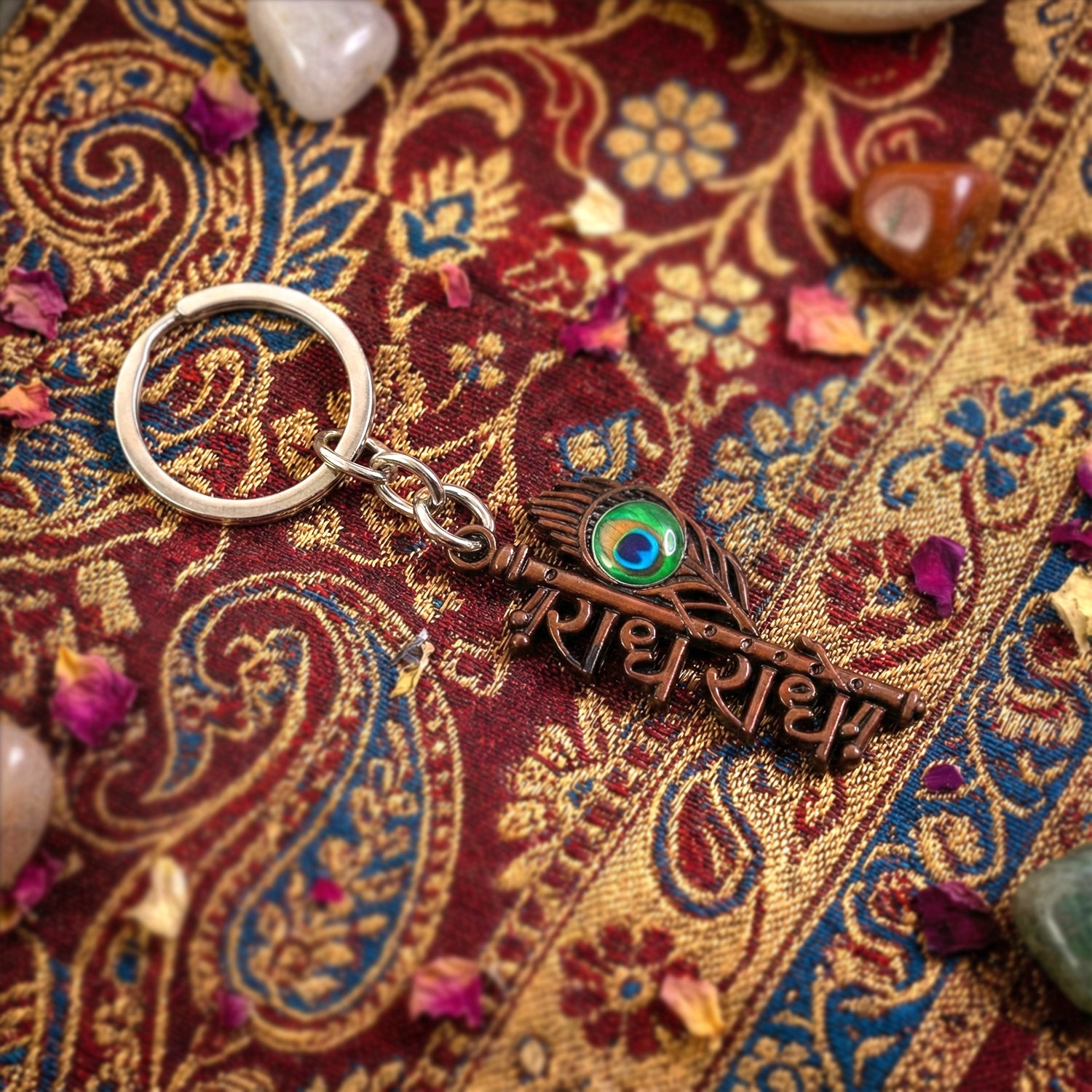 Radhe Radhe Metal Keychain with Peacock Feather Design – Divine Copper Finish (Mix Color) (1 Pc)
