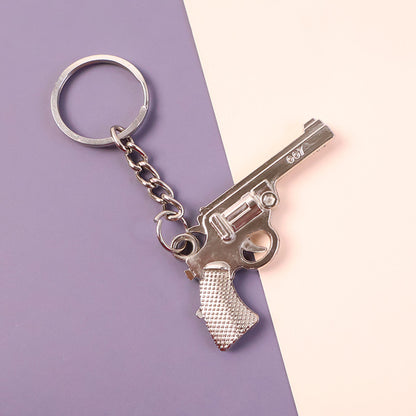 Revolver Shape Metallic Keychain – Stylish Gun Design Keyring