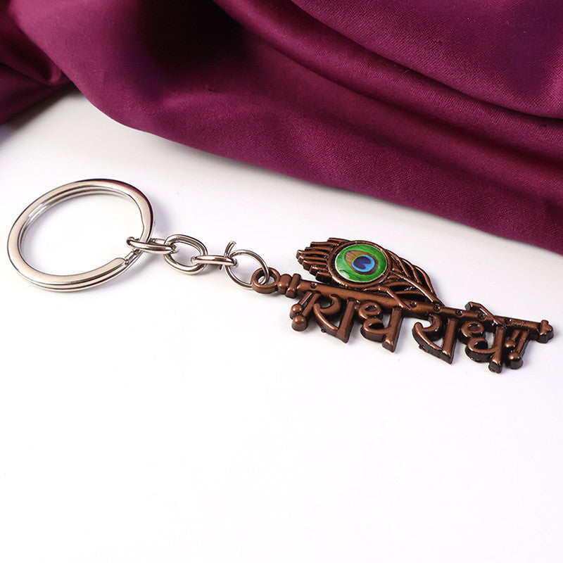 Stylish Radhe Radhe Metal Keychain with Peacock Feather Design – Divine Copper Finish Key Ring