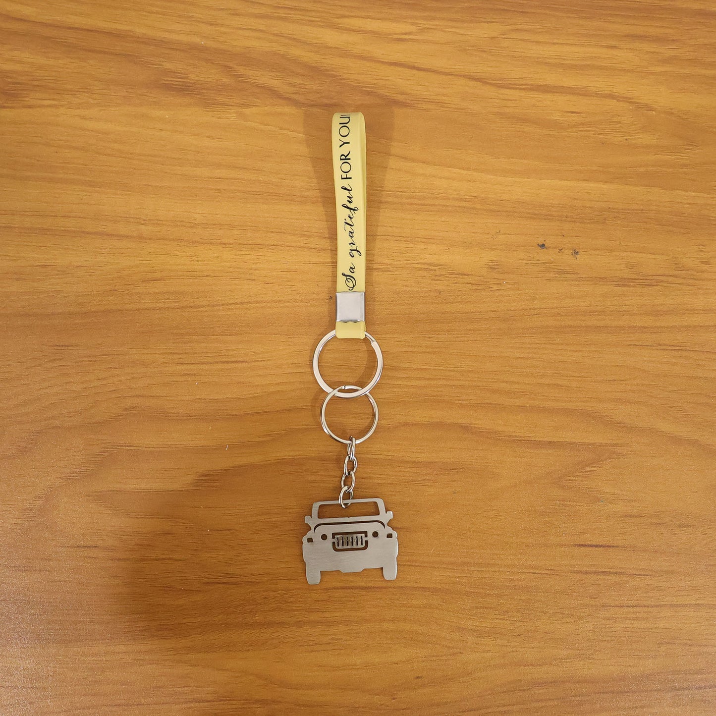 Lifestyle Image of Jeep-Shaped Keychain in Use