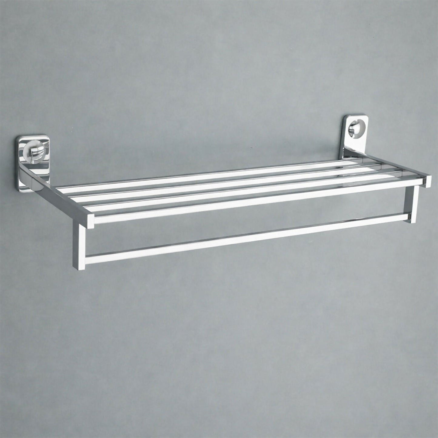 Chrome towel rack hanging towels in bathroom view 2