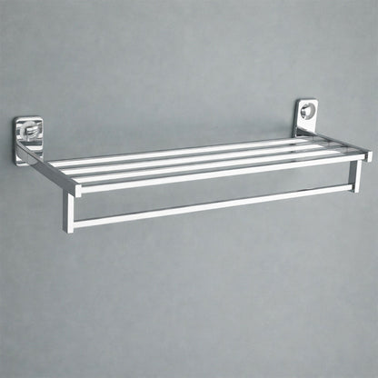 Chrome towel rack hanging towels in bathroom view 2