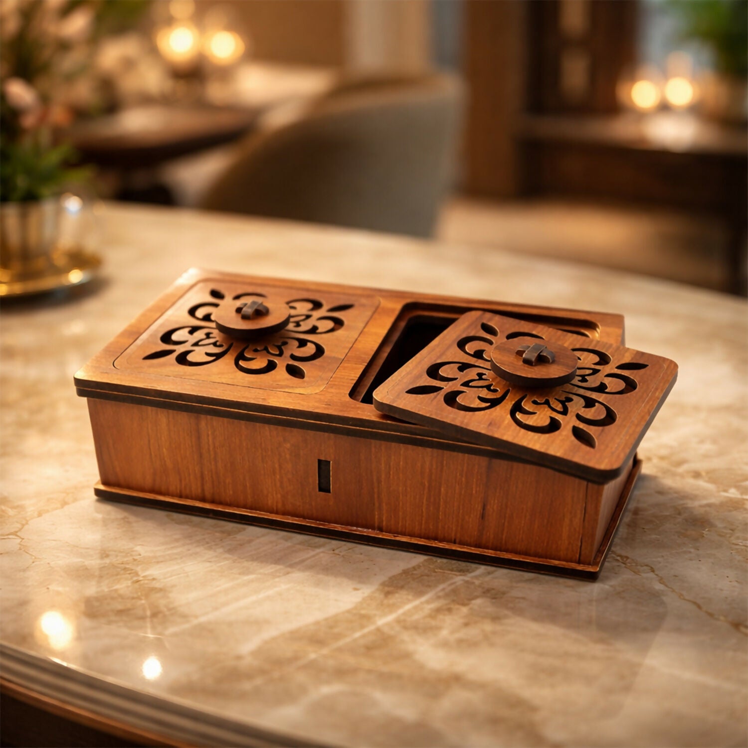 Close-up of intricate carved lid on wooden dry fruit storage box
