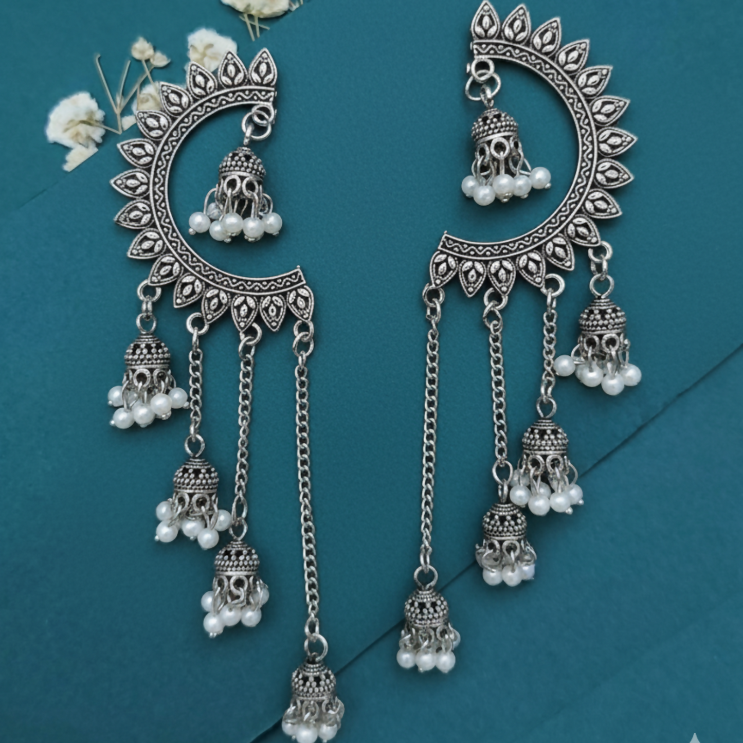 Oxidized Crescent Chandbali Earrings Featuring Long Jhumka Chains and Classic White Pearl Embellishments