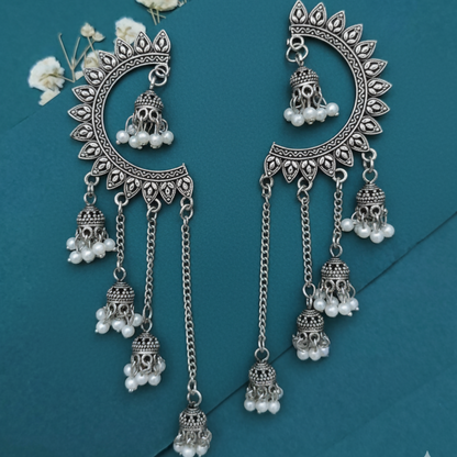 Oxidized Crescent Chandbali Earrings Featuring Long Jhumka Chains and Classic White Pearl Embellishments