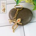 Krishna Metal Keychain – Durable Flute & Peacock Feather Design