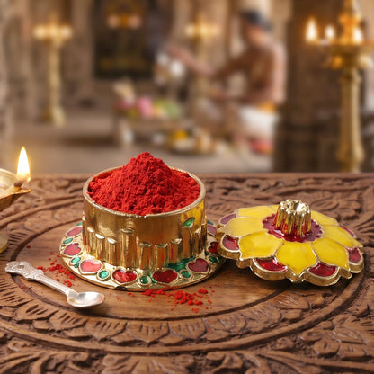 Golden traditional kumkum box for pooja