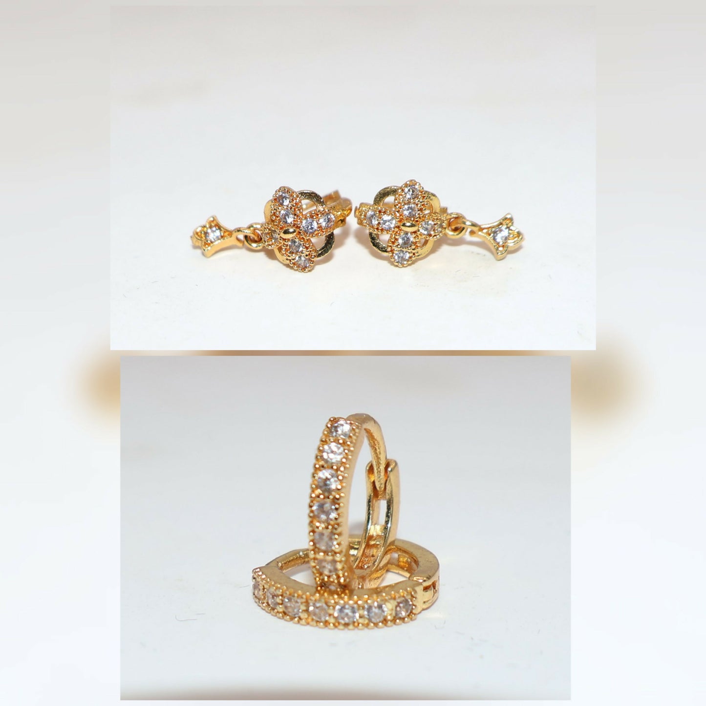 Gold plated zircon earrings set displayed on black background showing sparkle and design