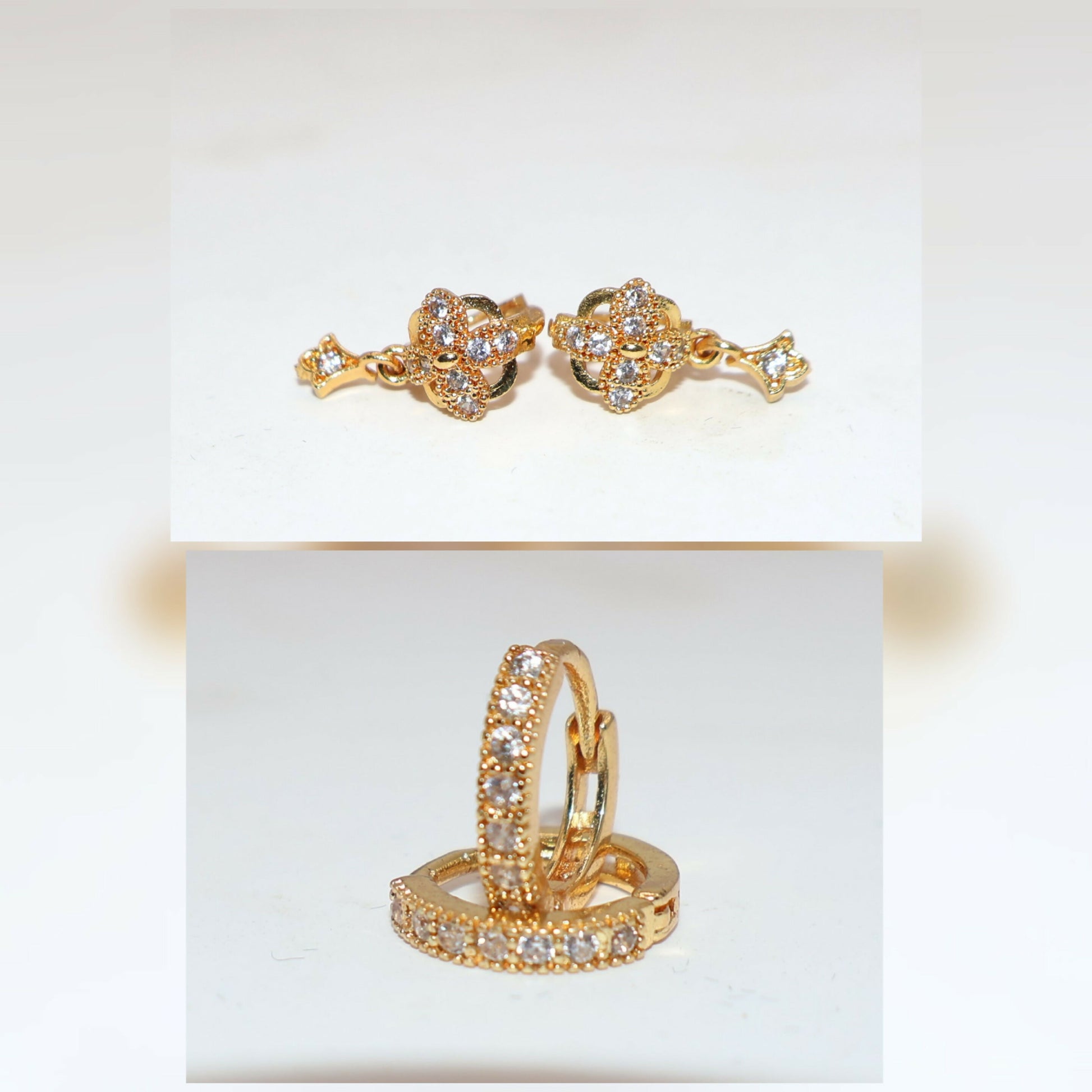 Gold plated zircon earrings set displayed on black background showing sparkle and design