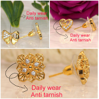Sparkling heart shaped gold plated stud earrings with embedded clear stones