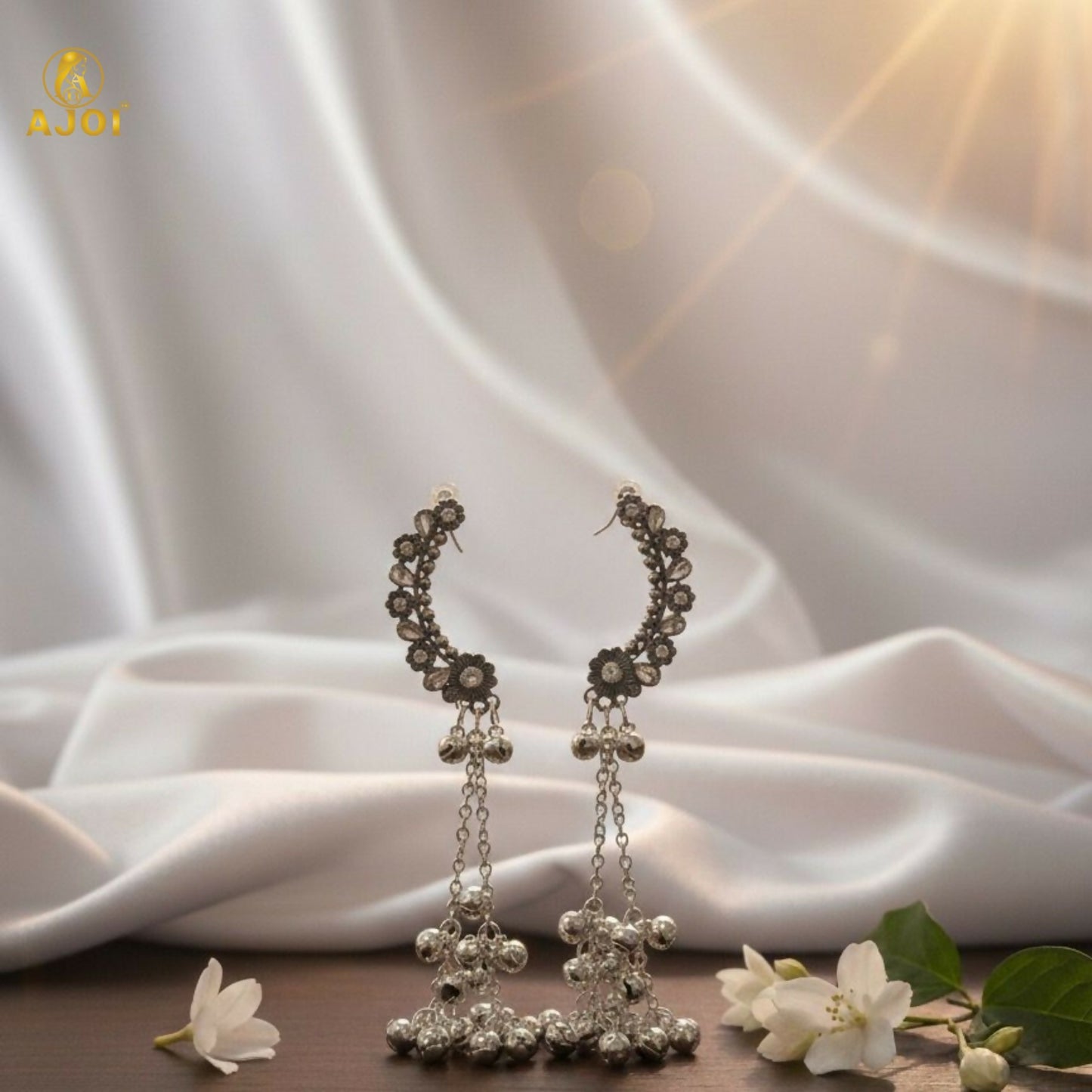 Silver Chandbali jhumka earrings styled with traditional outfit