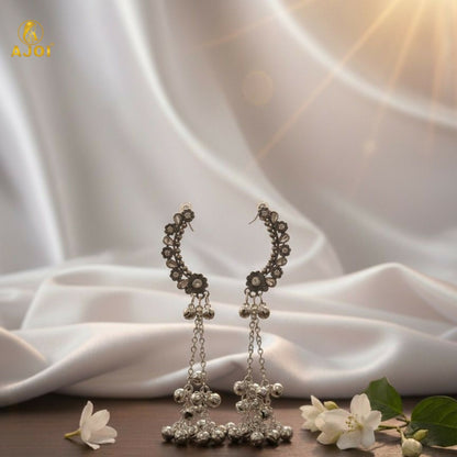 Silver Chandbali jhumka earrings styled with traditional outfit