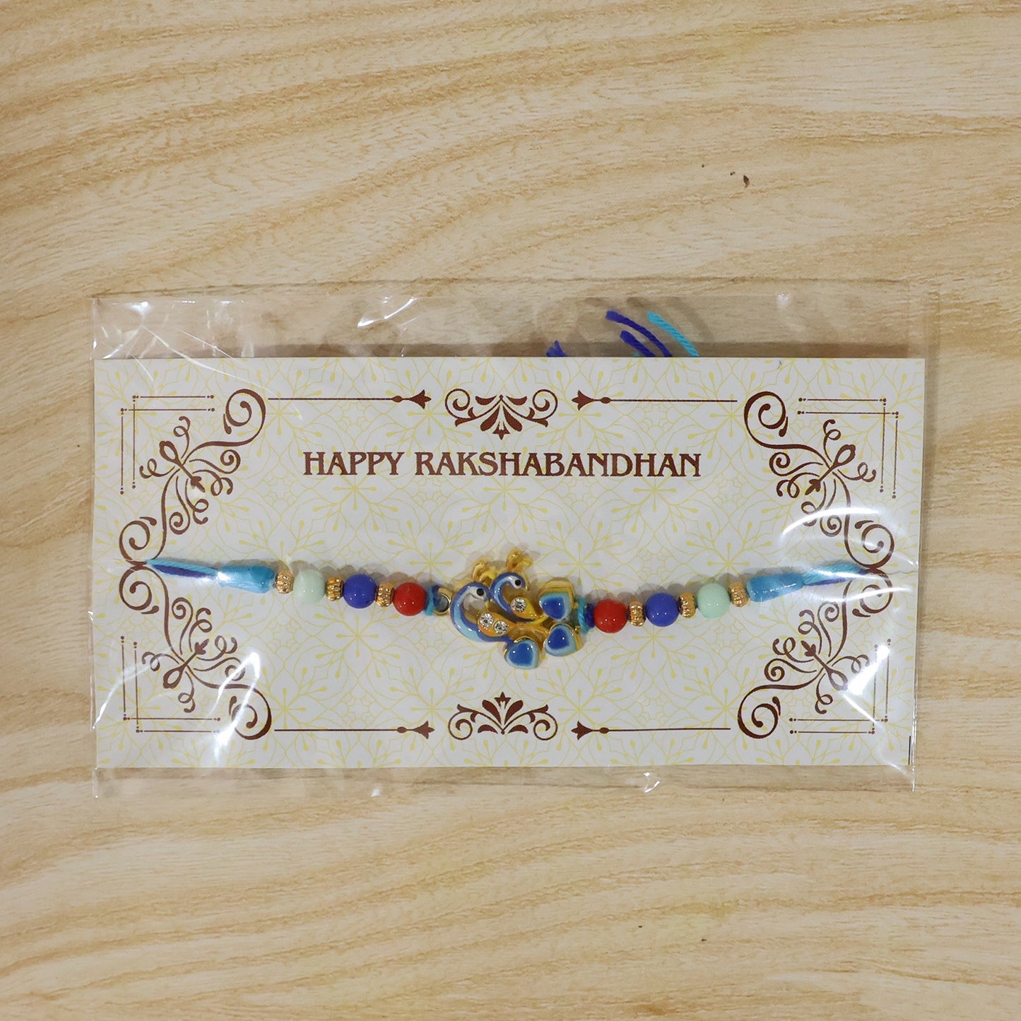 Traditional and stylish Twin Peacock Rakhi for brother
