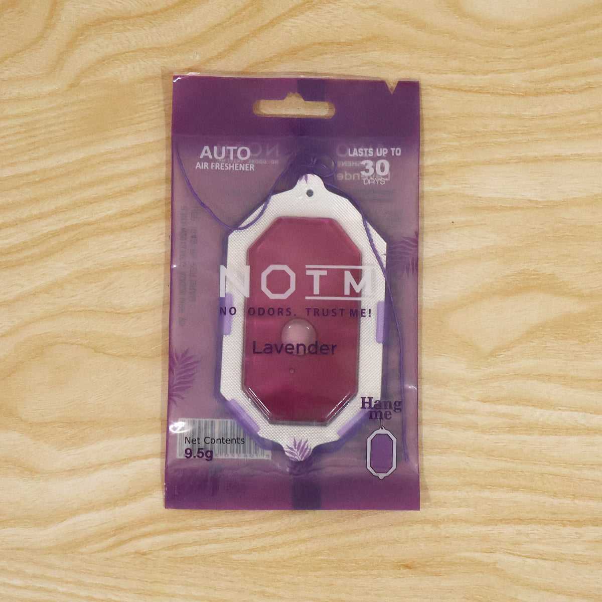 Display of hanging bathroom air freshener.