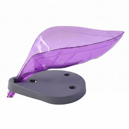 Soap tray holder in leaf shape with soap bar on kitchen sink