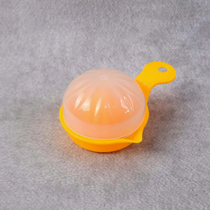 Juicer with citrus halves ready for pressing