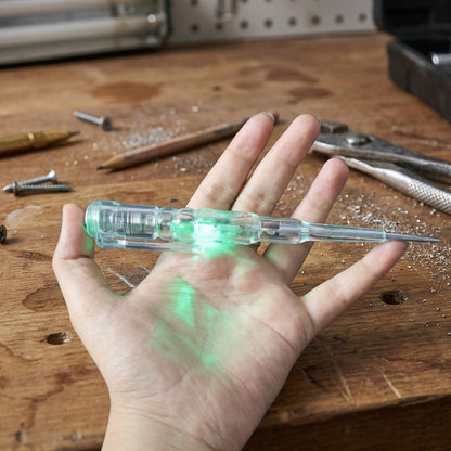Electrical tester pen in use on outlet