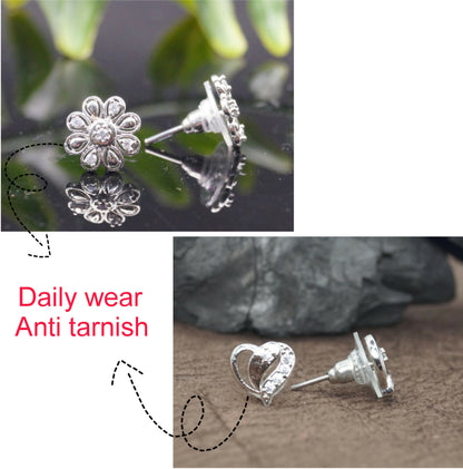 Silver flower stud earrings featuring sparkling cubic zirconia stones