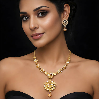 Close-up of sparkling stones on gold-tone floral cluster pendant necklace