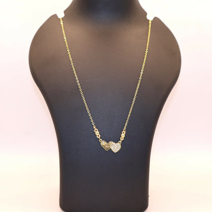 Gold Plated Double Heart Necklace displayed elegantly on a white background