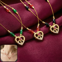 Heart Pendant Necklace with Tricolor Beads and Ruby Accent