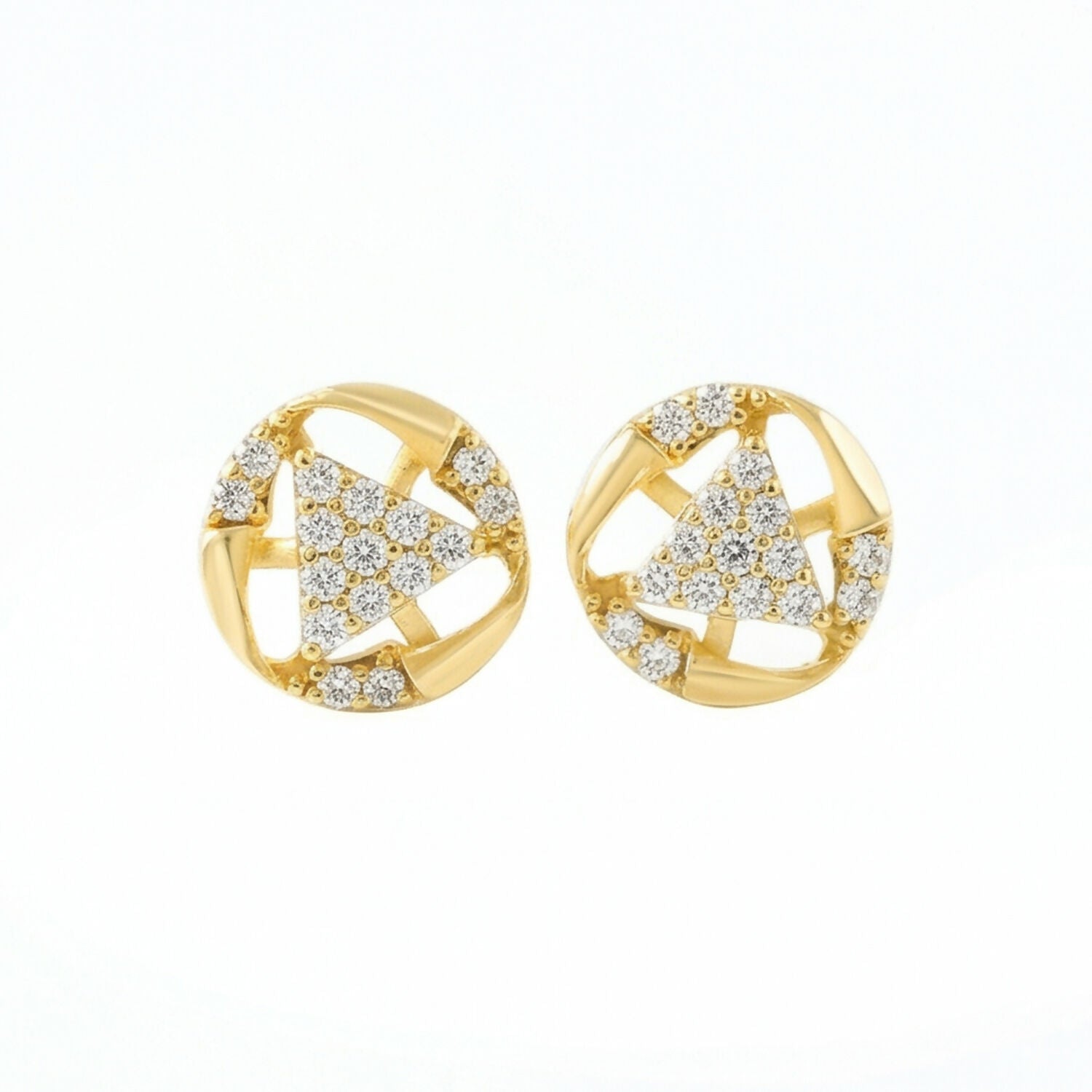 Gold stud earrings with intricate floral-inspired design and stones