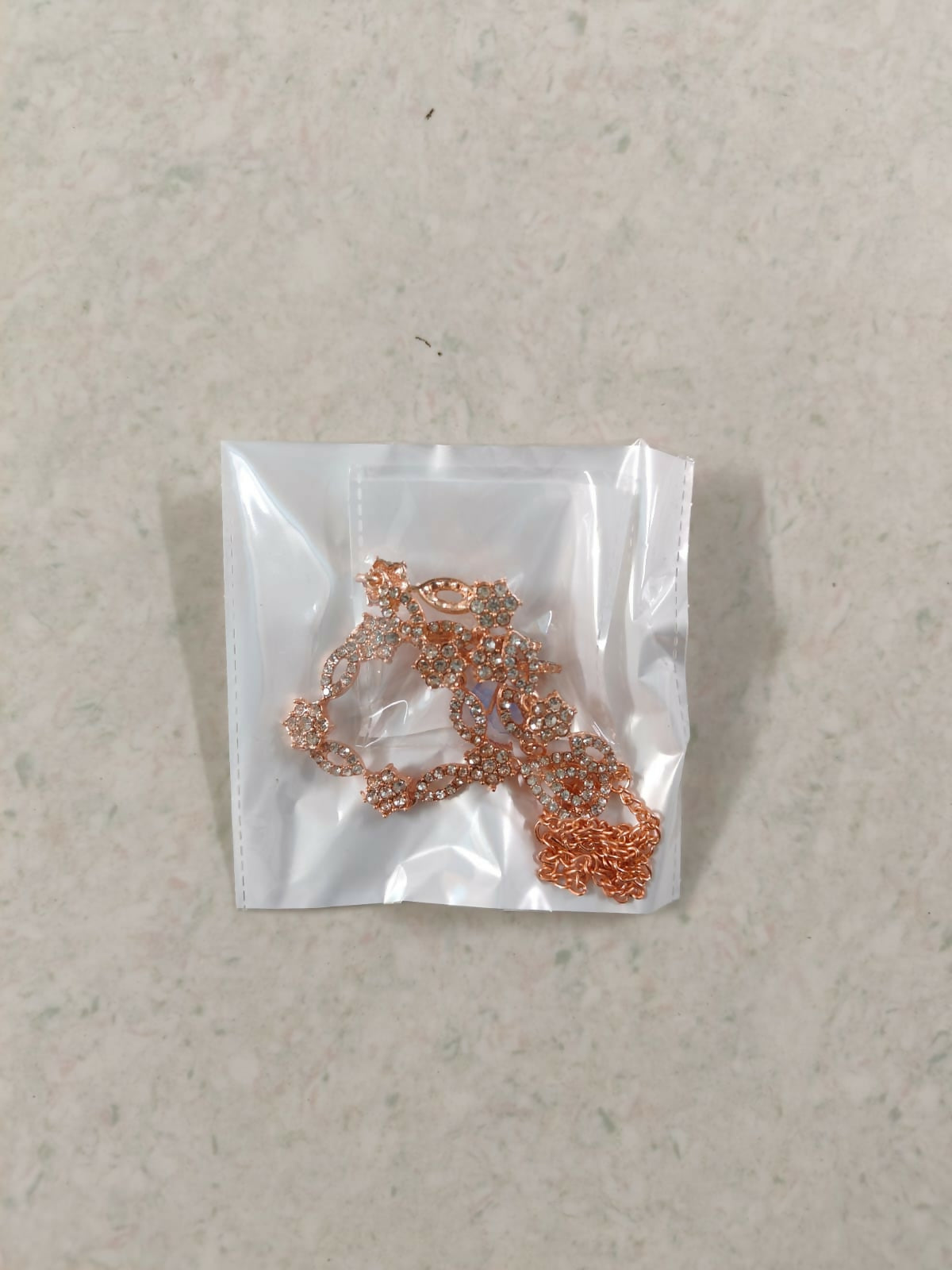 Styled image of floral necklace set showcasing craftsmanship