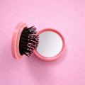 Foldable Hair Brush – Compact Travel Comb with Built-In Mirror