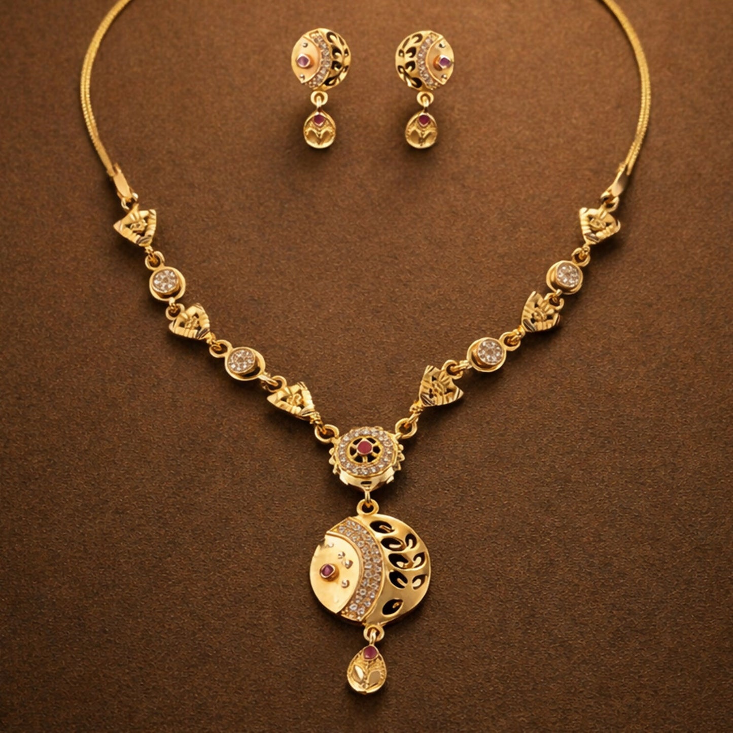 Close-up of gold-tone beaded chain necklace with sparkling stones